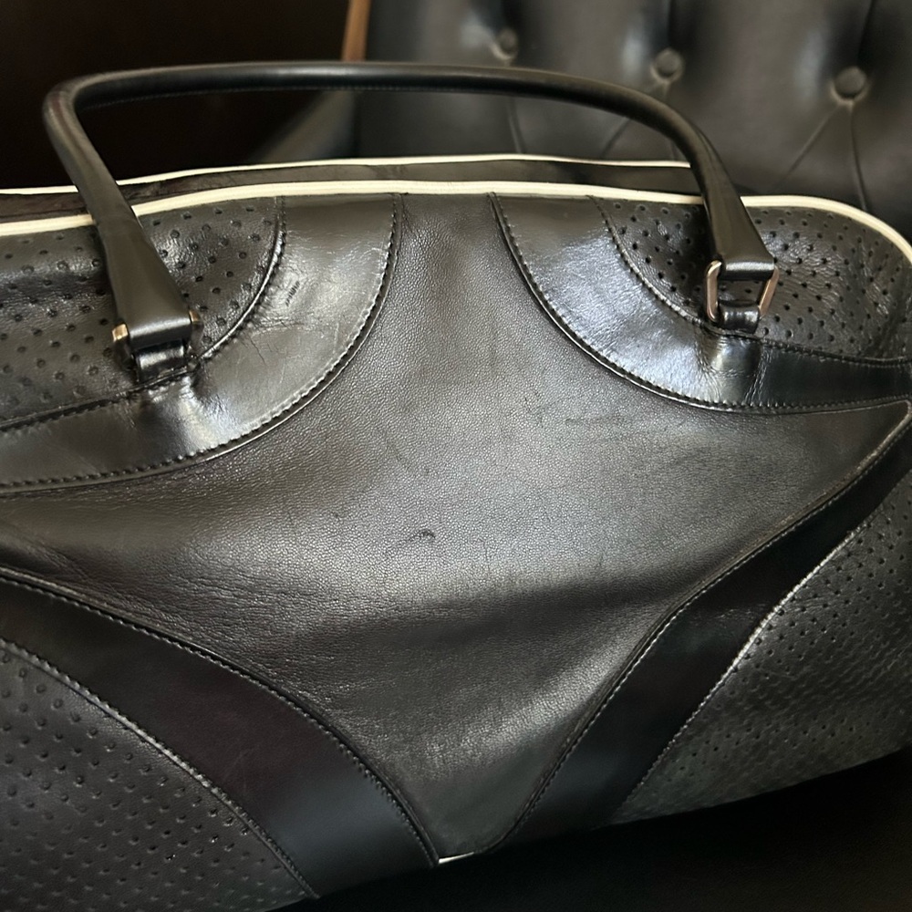 Rare vintage PRADA 'Vitello Drive' Black Leather Bowling Bag modeled by Gisele - Picture 15 of 16